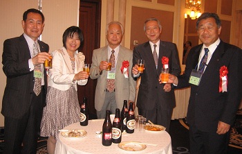 櫻井幹事と来賓.jpg